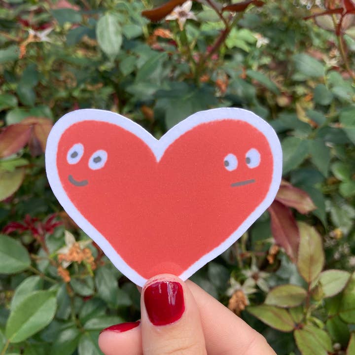 Weird Heart Sticker | Conflicted Feelings Sticker | Red Love Heart Sticker | Funny Vinyl Sticker | Smiley Face Heart | Shop Frankie Sue for wholesale by Frankie Blue