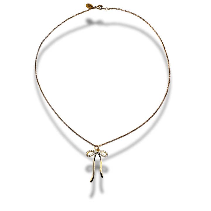 Luxe Bow Necklace 18" Chain Dainty Charm Necklace for wholesale by Alisa Michelle Designs Inc.