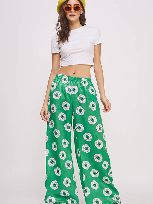 MID RISE ALIEN HEAD PRINT STRAIGHT LEG SATIN PANTS for wholesale by JADE BY JANE