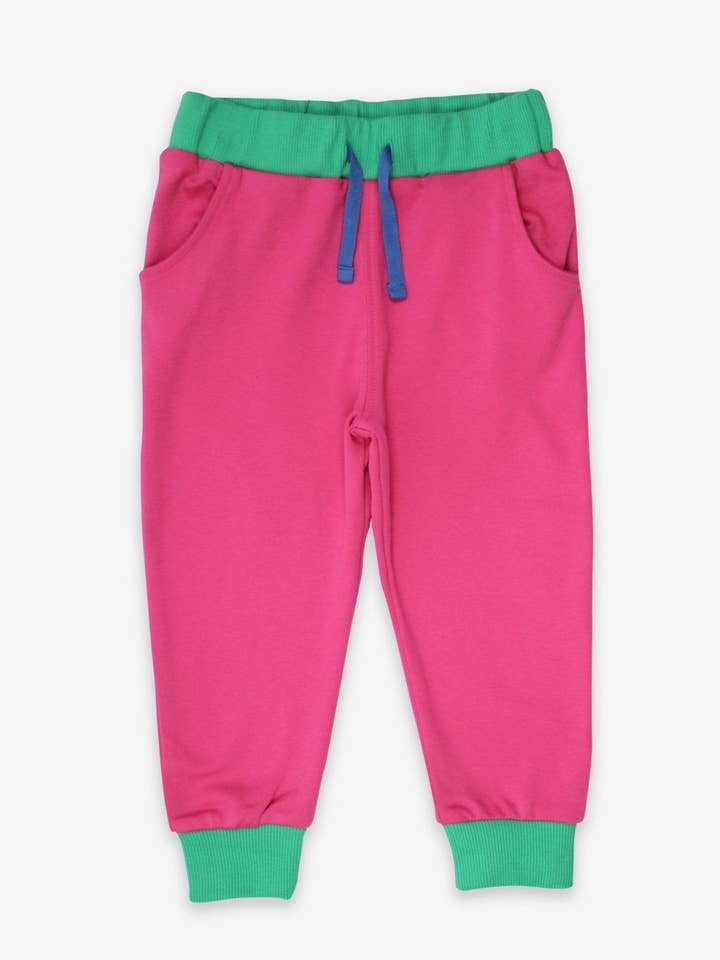 Pantalon de survêtement pour enfants en coton bio rose pour la vente par Toby Tiger GmbH