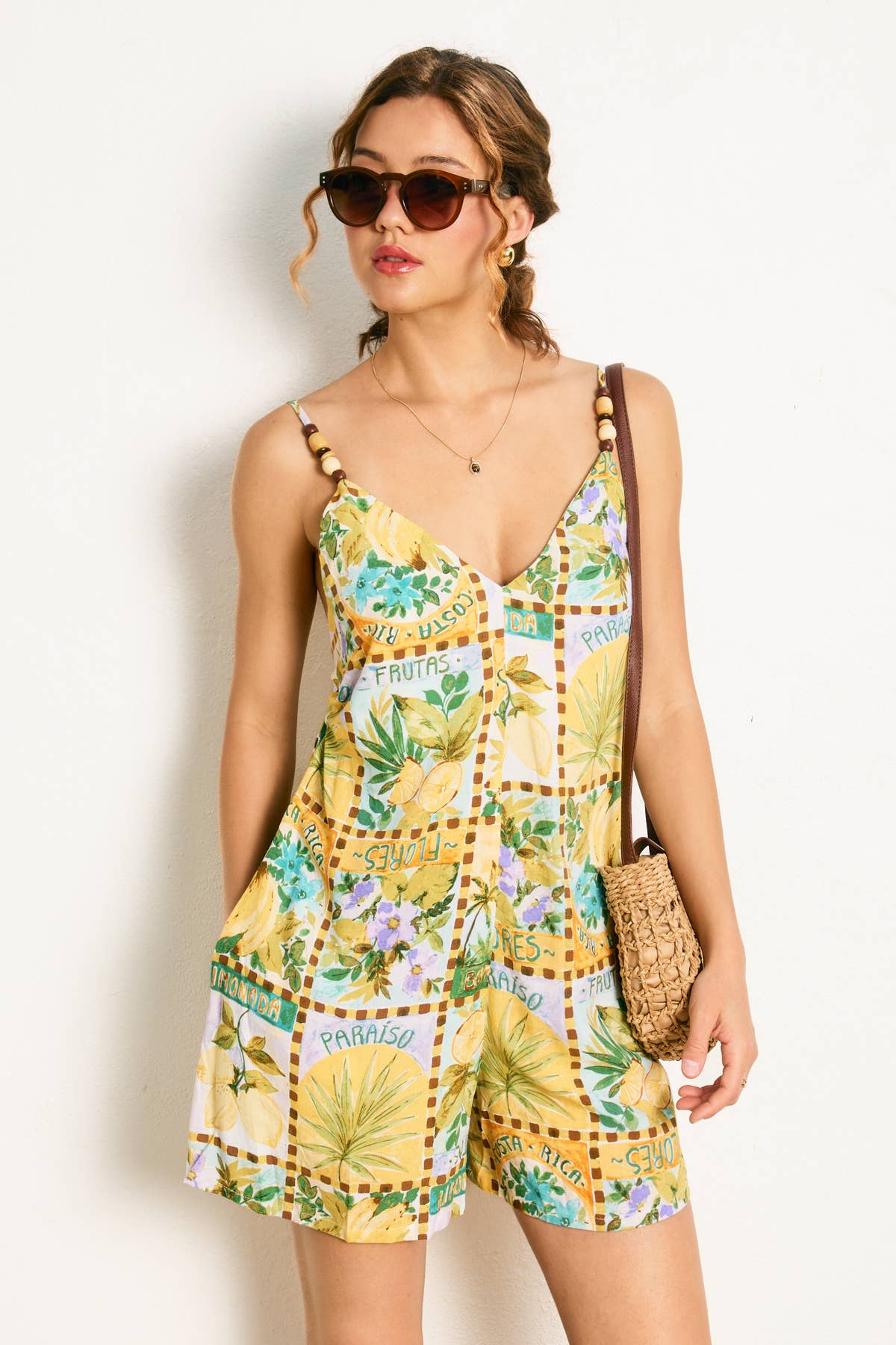 TROPICAL SUN Isla Palma Tie Back Detail Romper for wholesale on Faire0