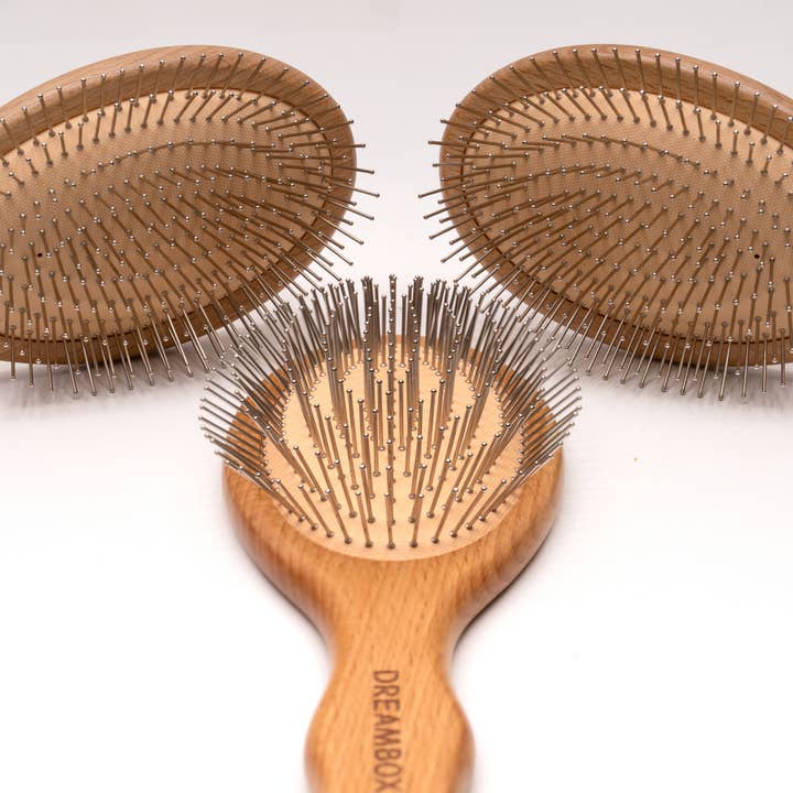 Dreambox Beauty – Engroshandel Hårbørste/kam – NY Gua Sha Detangler: En hovedbundsstimulerende børste2