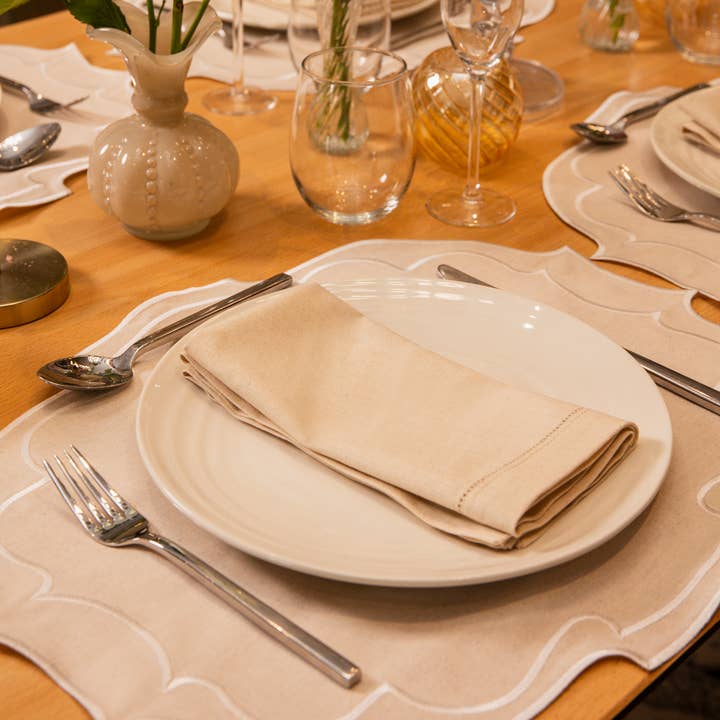 Top Tables Retail - Wholesale Placemat - Taylor Embroidered Oval Placemats - Natural • Set of 62
