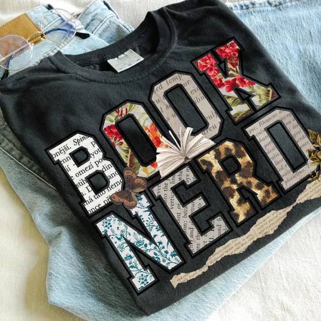 Book Nerd on Comfort Colors Tee for wholesale by Stitched in Honey