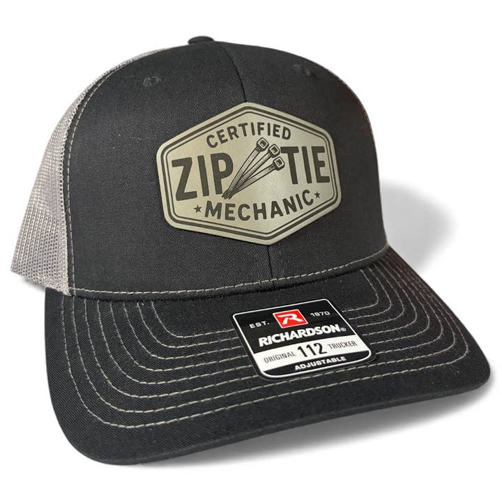Zip Tie Mechanic Design - Richardson 112 Leather Patch Trucker Hat for wholesale by Brave Mind Hat Co