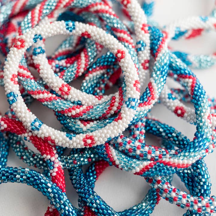 Aid Through Trade - Wholesale Jewelry Set - The Original Roll-On® Bracelet Firecracker - Set of 122