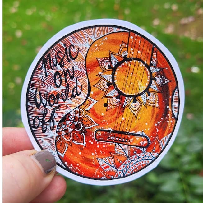 Music On, World Off Stickers for wholesale by Wild & rare
