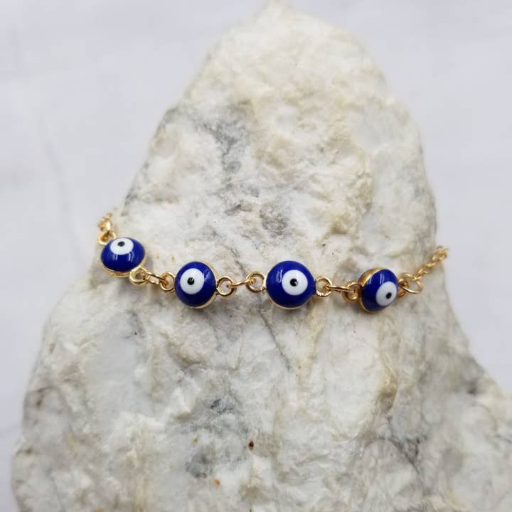 Bracelet Œil Mauvais Bleu Turc Quadruple pour la vente par The Pretty Jewellery