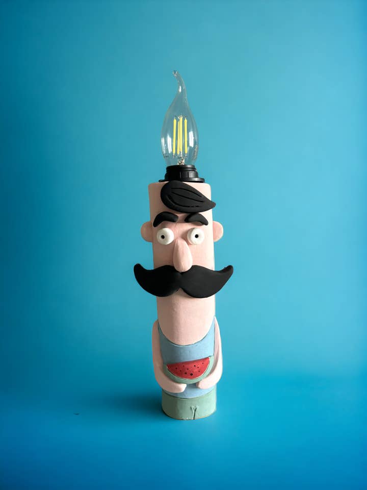 Ceramic Beach Guy Lamp for wholesale by Thetis Art Studio