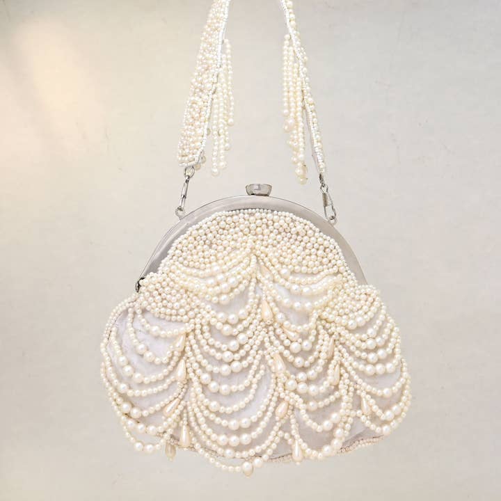 Statement Bag Perla and other Purchase Wholesale conchiglie. Free Returns & Net 60 Terms on Faire trending on Faire.