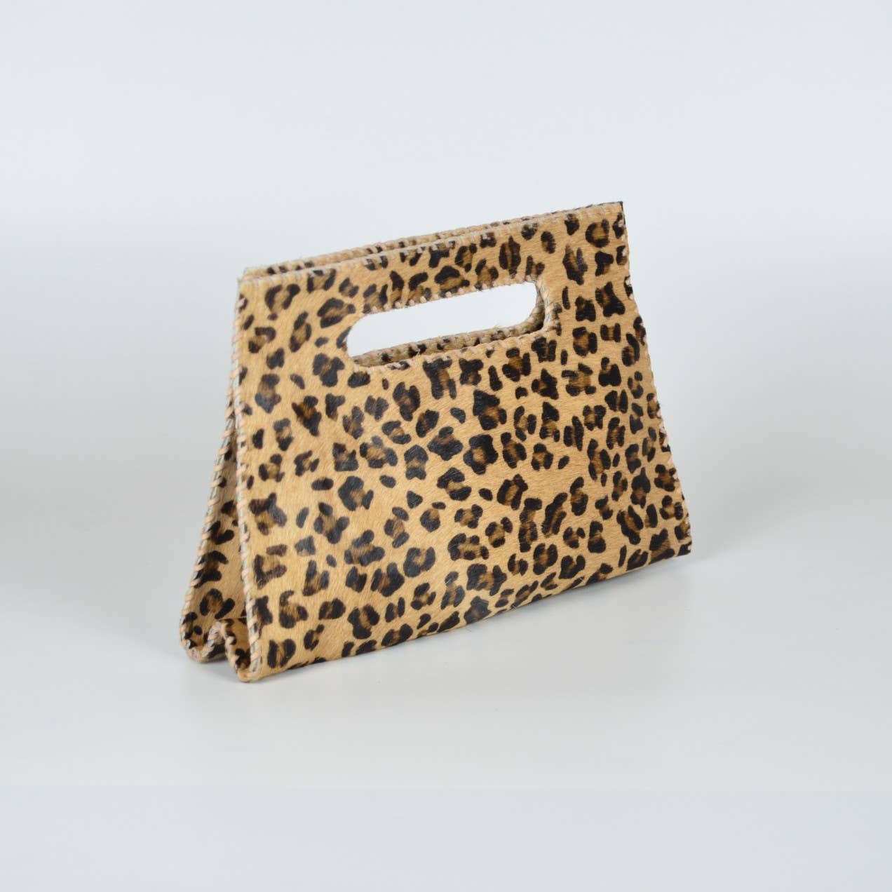 STUDIO CALEIDOSCOPE – wholesale Clutch bag – women's – Mia Clutch Printed Hairon Leather1