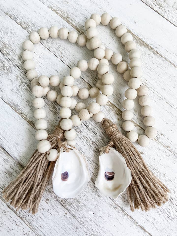 Oyster Shell Wooden Bead Garland with Tassels for wholesale by Made on Maidstone
