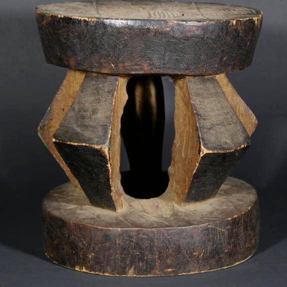 Sgabello rotondo comune nero per la vendita all'ingrosso da parte di The Niger Bend