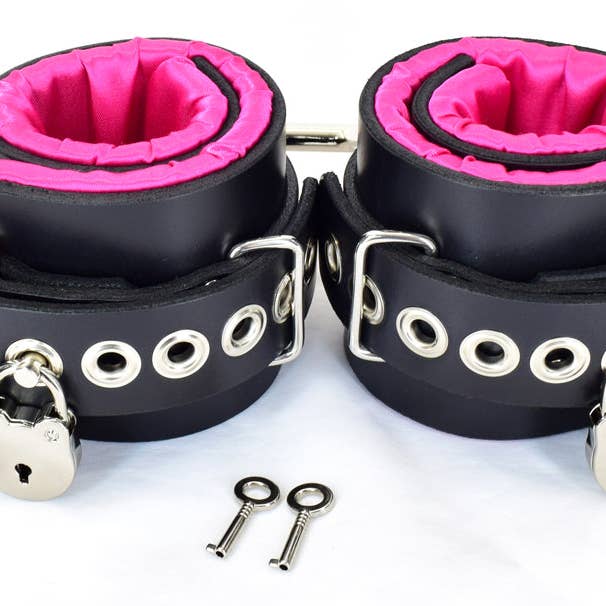 Locking Pink Satin Lined Leather Ankle Bondage Cuffs for wholesale by Axovus