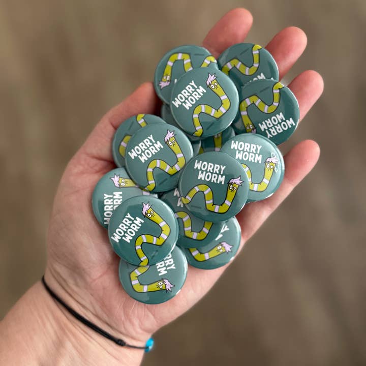 Worry Worm Pinback Button for wholesale by Stone Donut Design, LLC