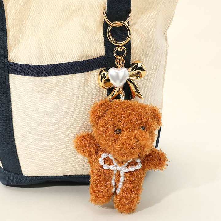 Porta-chaves / Amuleto de Saco de Peluche de Urso de Pelúcia com Laço e Coração de Pérola por atacado de Sensibling Corp.