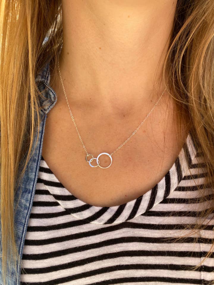 Silver infinity three circle necklace for wholesale by Rose Burkhardt Jewelry