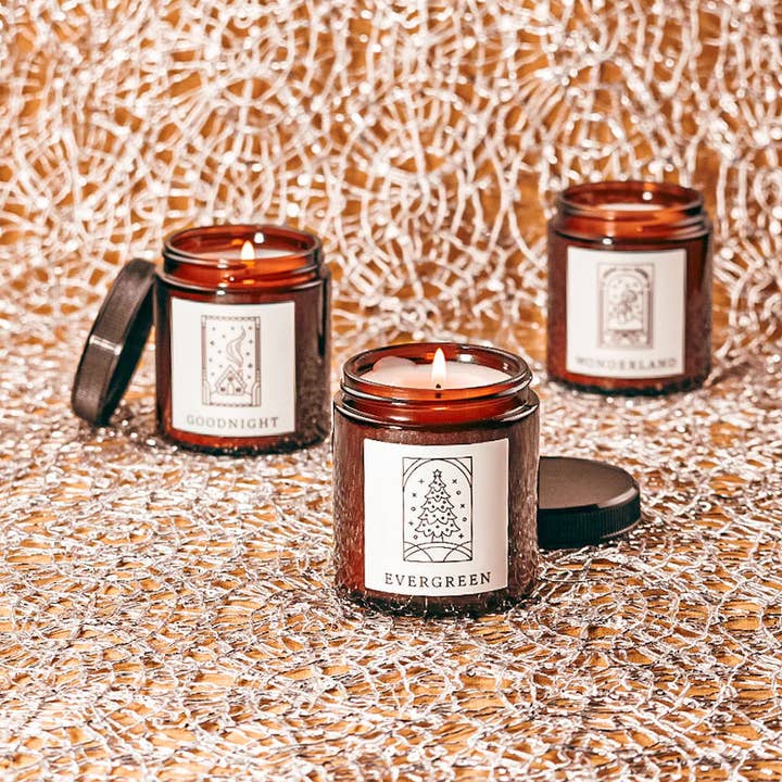 Evergreen 3.4oz Small Fine Fragrance Amber Jar Candle for wholesale by Herland Home