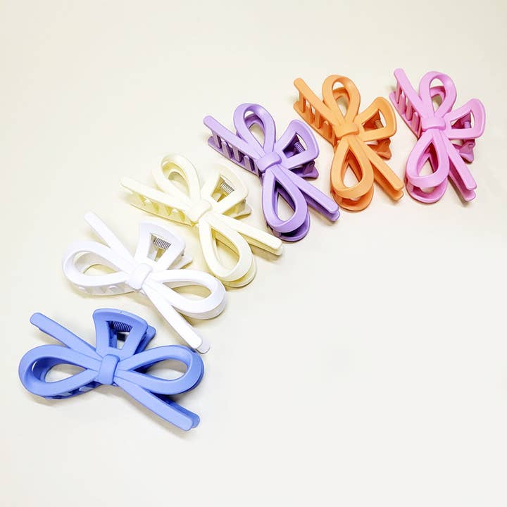 Matte Color Ribbon Shaped Hair Claw Clip for wholesale on Faire