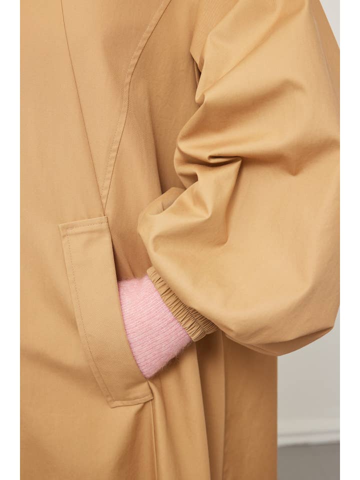 Sand Flekkpetrell mac coat for wholesale on Faire13