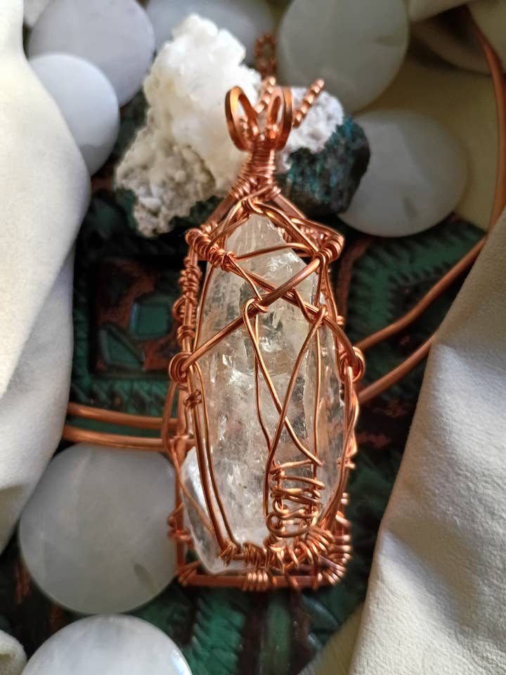 Raw Clear Quartz Copper Cage Talisman Pendant Hand Wrapped for wholesale by Norahz Boutique