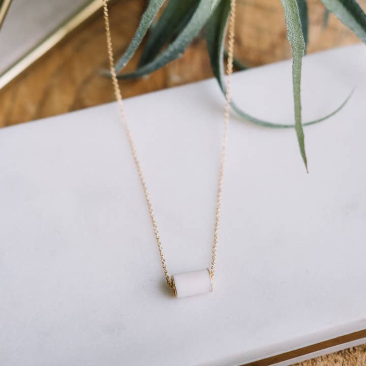 gold edged scroll necklace for wholesale by Remnant Studios