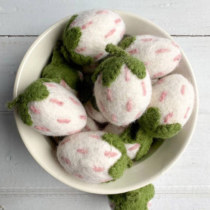 One White Felt Strawberry With A Forest Green Stem for wholesale by Sewing Seeds Play