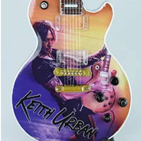 Keith Urban miniature guitar 1 for wholesale by Ocean Peak Australia and New Zealand Pty Ltd