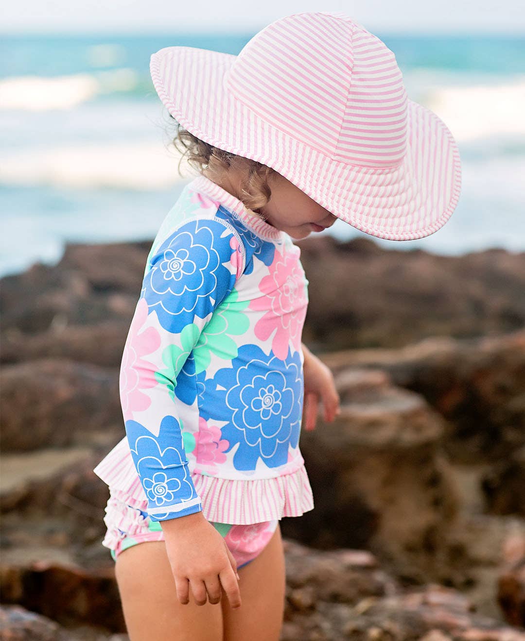 RuffleButts + RuggedButts - Wholesale Rashguard - Kids - Girls Pastel Petals Long Sleeve Rash Guard 2-Piece Swimsuit with Signature Rear Ruffles1