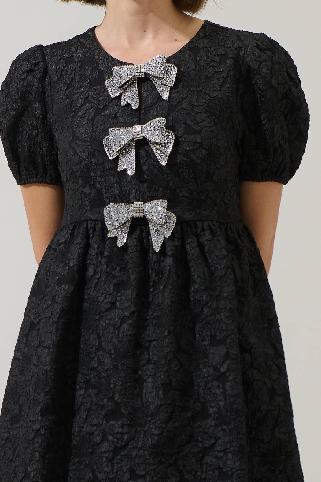 Black  Arian Jacquard Glow Bow Mini Dress for wholesale on Faire5