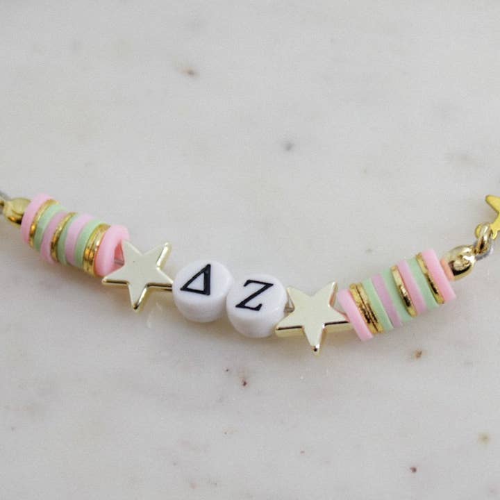 Porte-clés Delta Zeta pour la vente par White Daisy Jewelry LLC