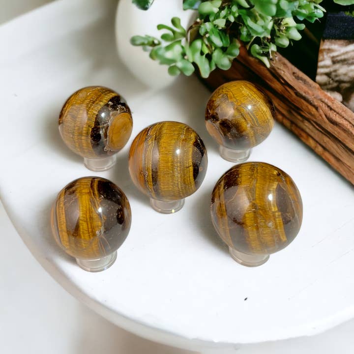 Tigers Eye Spheres - 1 kilo for wholesale by Raj Minerals Inc