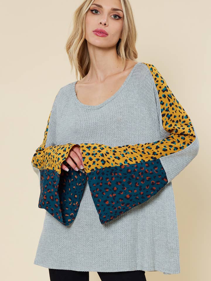 ST6590 - Bell sleeve top with color contrast leopard print for wholesale by FSL Apparel