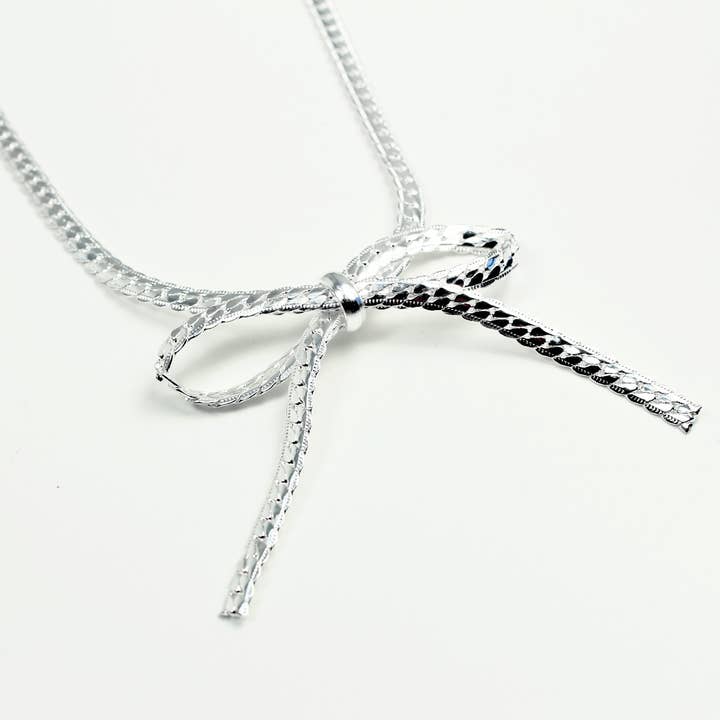 Short silver bow chain for wholesale by Accessoires by KHB