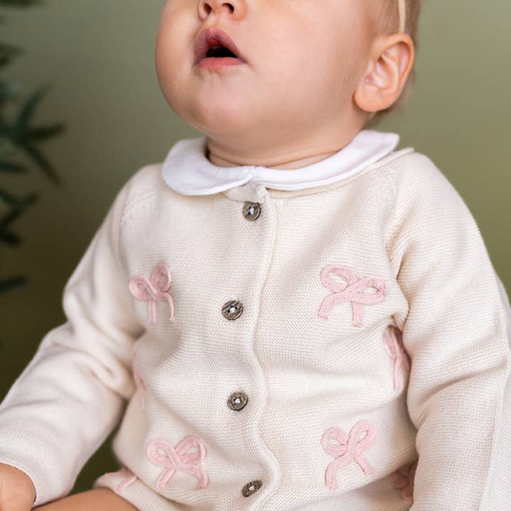 Zoe Bow Sweater Knit Baby Button Cardigan (Organic) for wholesale by Viverano Organics