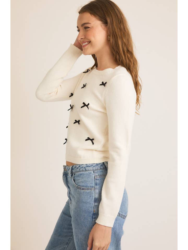 CREAM ROUND NECK LONG SLEEVE BOWS ON FRONT SWEATER for wholesale on Faire