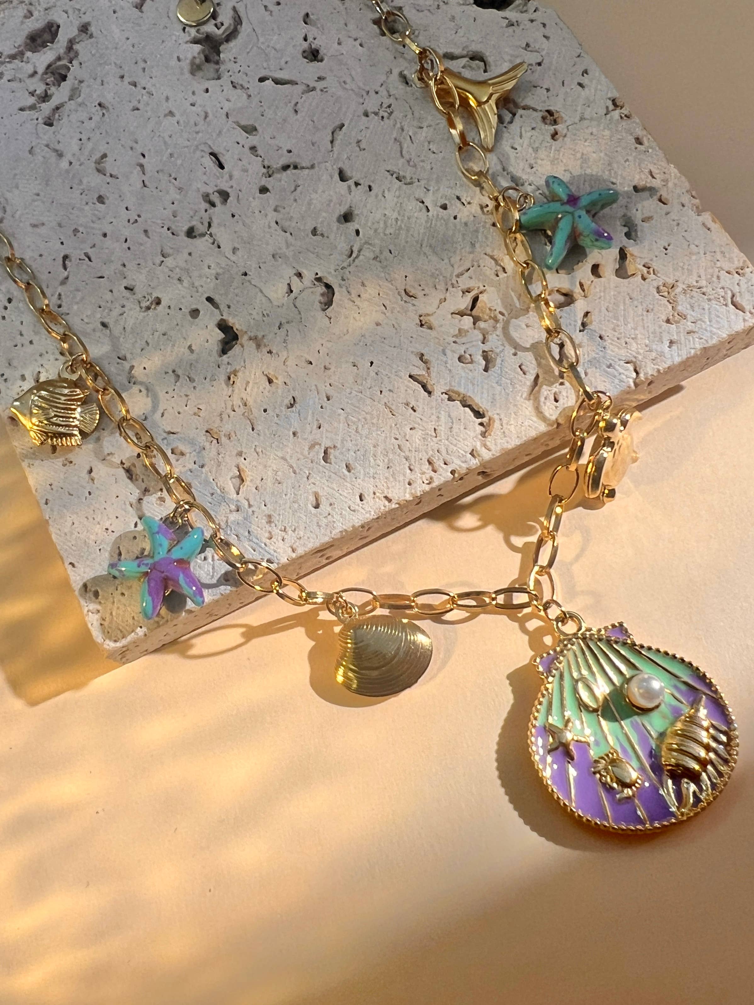 COSMOS – Großhandel Schmucksets – Muschel-Halskette und Ohrring-Set aus Stahl2