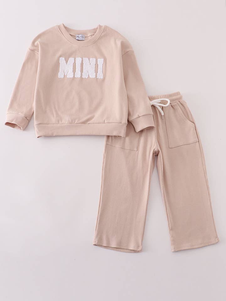 Conjunto de calças MINI em creme com ponto francês por atacado de Mom & Co.