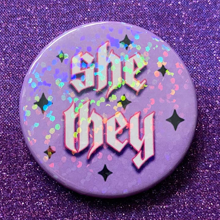 She/They Pronoun Holographic Pin Badge for wholesale by Magical Meow