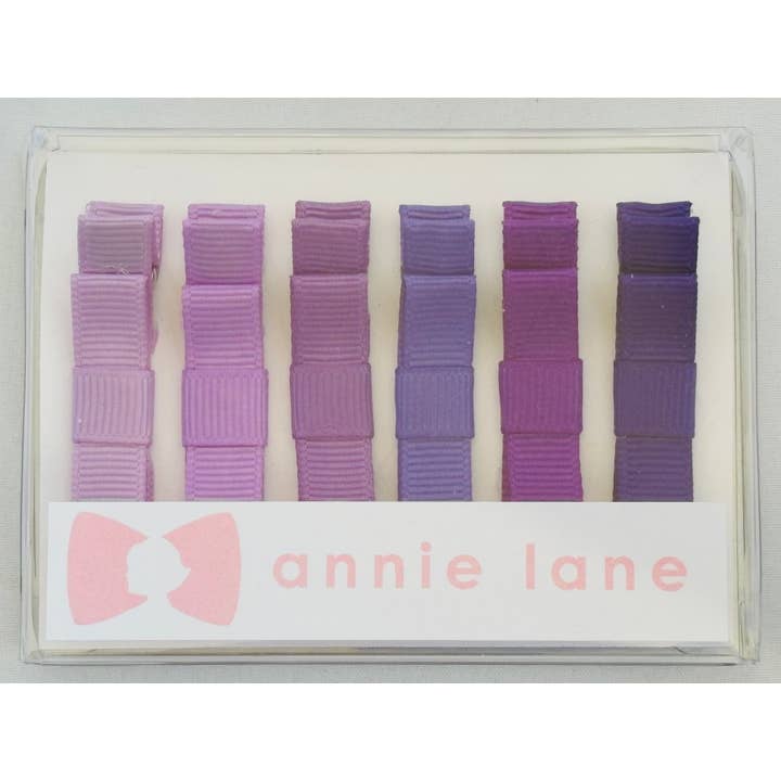 Låda med 6 hårrosetter - lila enfärgade för wholesale av Annie Lane