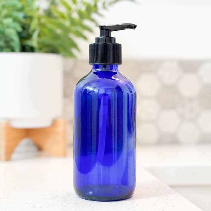 8oz Empty Blue Glass Lotion/Soap Bottle for wholesale by Matrix Aromatherapy