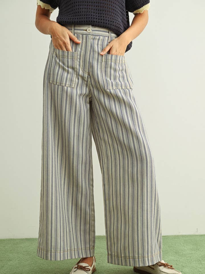 P6478 CALÇAS COM ESTAMPA DE RISCA MULTICOLORIDA E BOLSO FRONTAL por atacado de MIOU MUSE