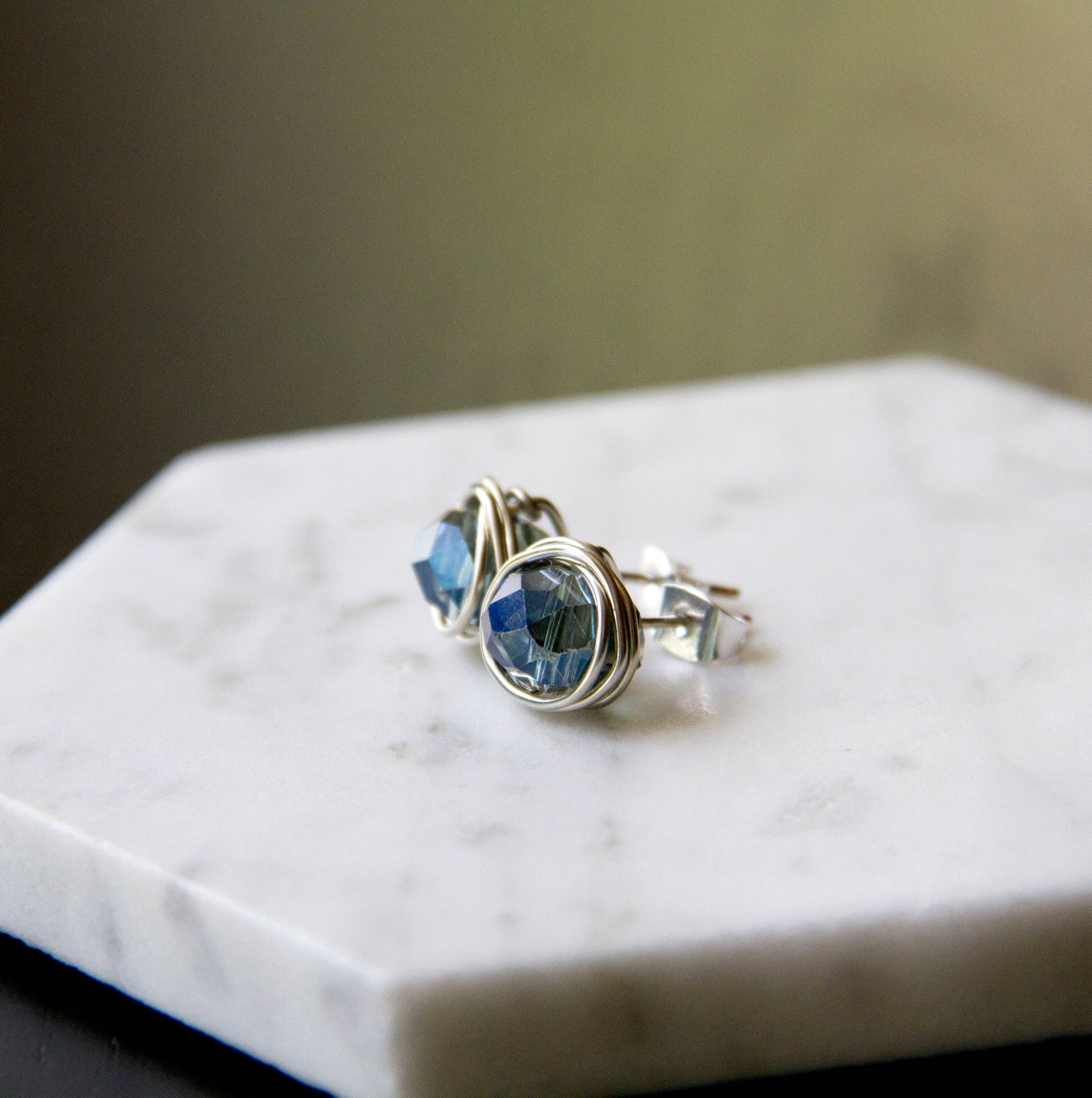 The Jovi Lyne Collection – wholesale Stud/post earrings – Chinese Crystal Stud Earrings Wrapped In Silver - Birthstone - December - Blue3