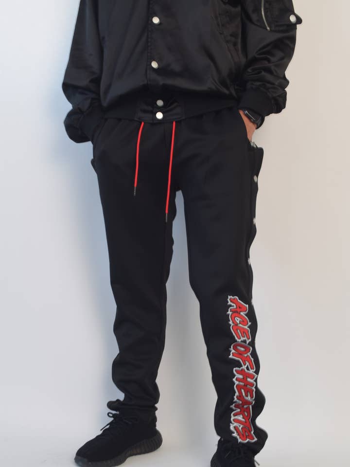 Calças rasgadas de malha por atacado de Ace Of Hearts World Wide