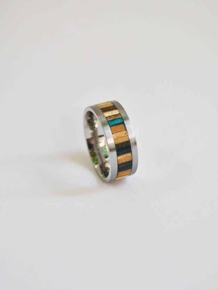 Titanium ring and recycled skateboard for wholesale by Melody Boards