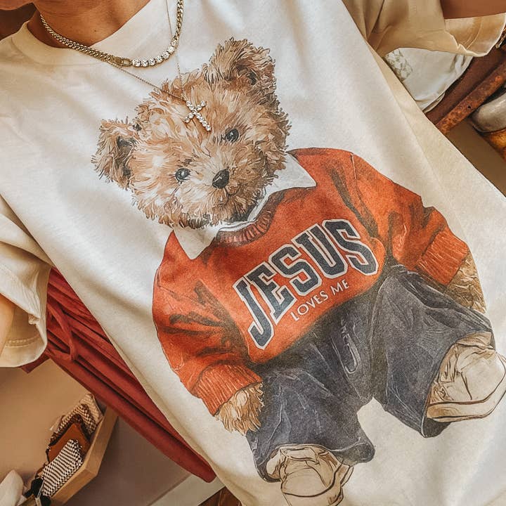 Jesus Loves Me Teddy Bear Religious Graphic Tee for wholesale by Amy Anne Apparel Inc