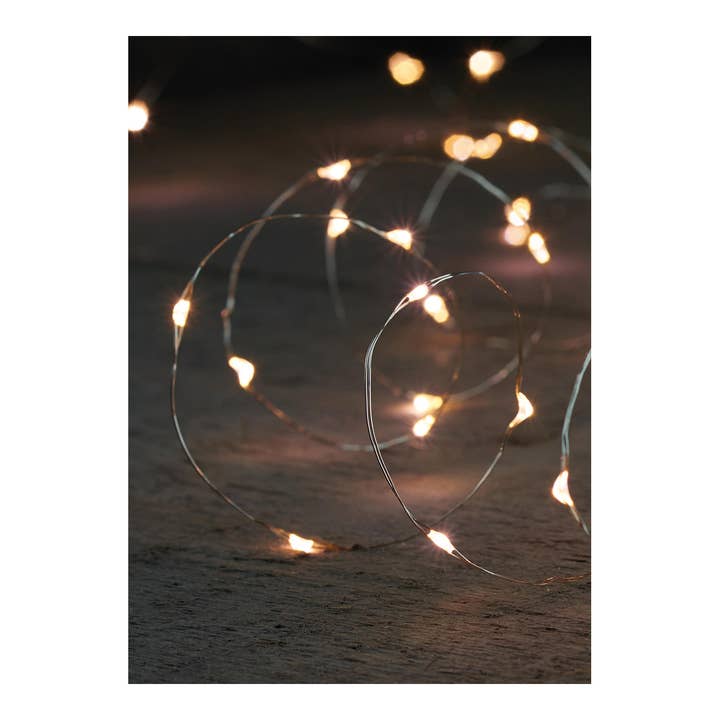 LED string lights made of silver wire with timer function, warm white, 20 LEDs, 1 m length + 10 cm connection cable for wholesale by Wurm