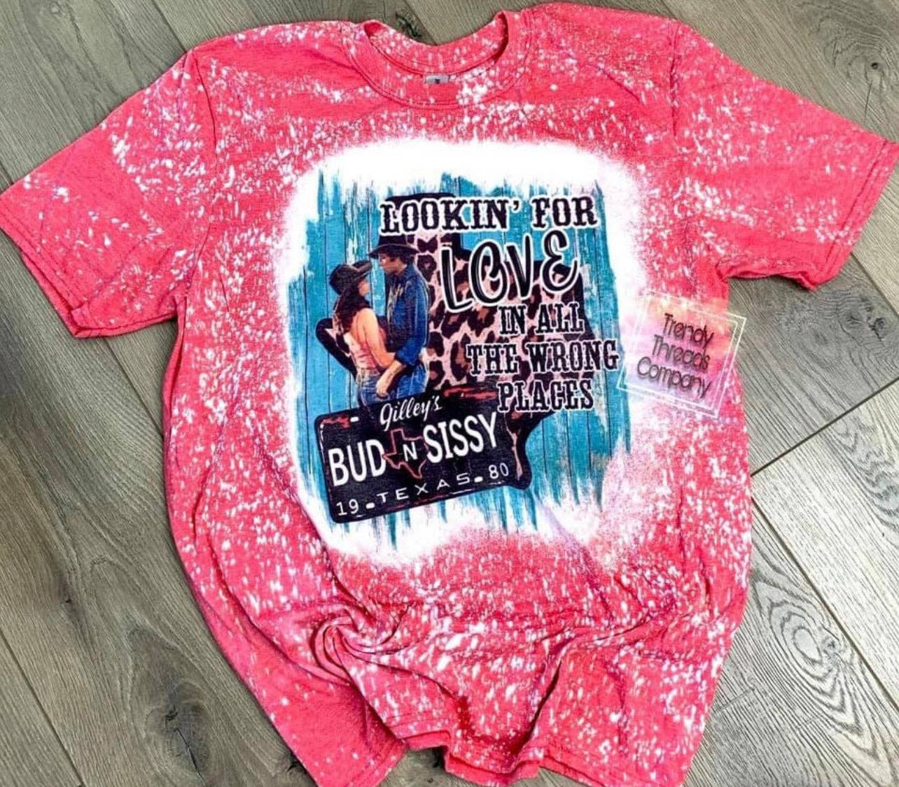 Trendy Threads Designs LLC – wholesale Screen printed t-shirt – Women′s – Bud & Sissy Shirt | Urban Cowboy0