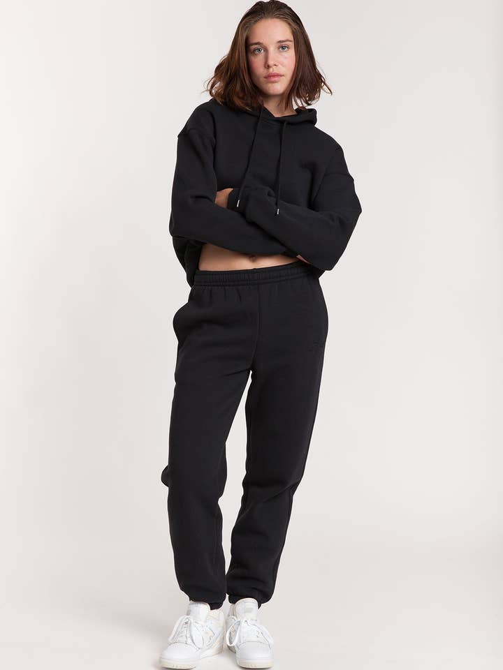 "SORRY PARDON QUOI" JOGGERS IN BLACK for wholesale by Lazypants