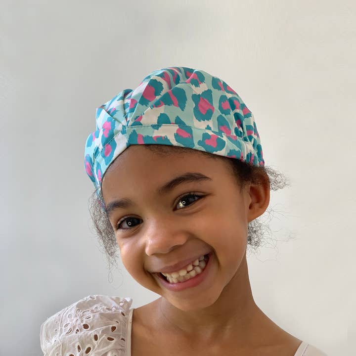 Minny' Shower Capsule Sky Leopard (Aqua) for wholesale by hairCAPsule™